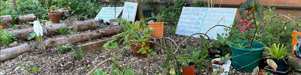 Green plants and raised beds in the church garden